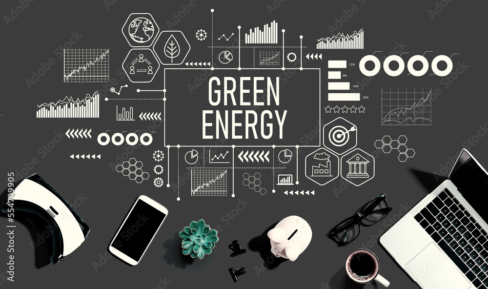 Green Energy concept with electronic gadgets and office supplies - flat lay