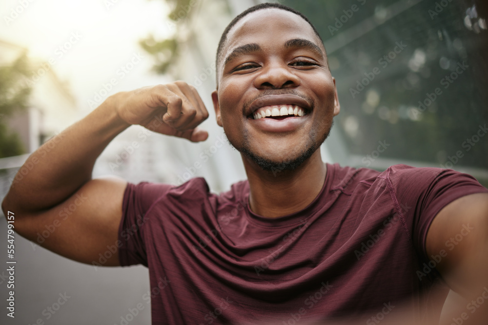 Selfie, smile and fitness arm flex of a black man athlete ready for running, workout and exercise. T