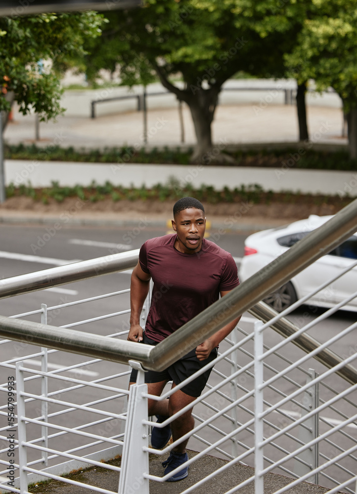 Black man, fitness and running on city stairs in cardiovascular workout, healthcare exercise or morn