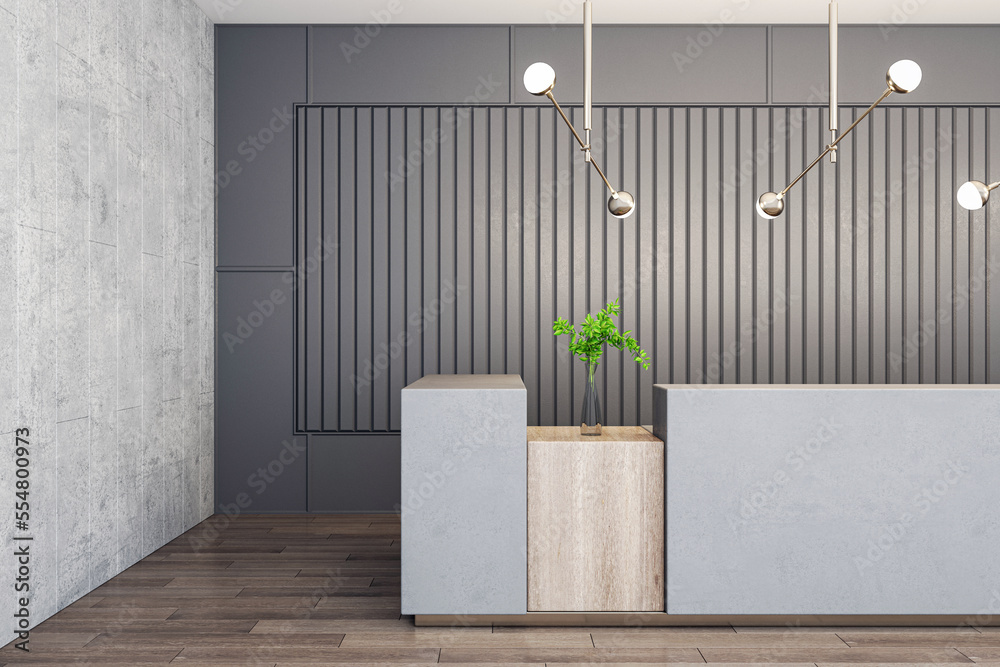 Front view on concrete reception desk with green plant in glass vase on wooden surface in stylish sp