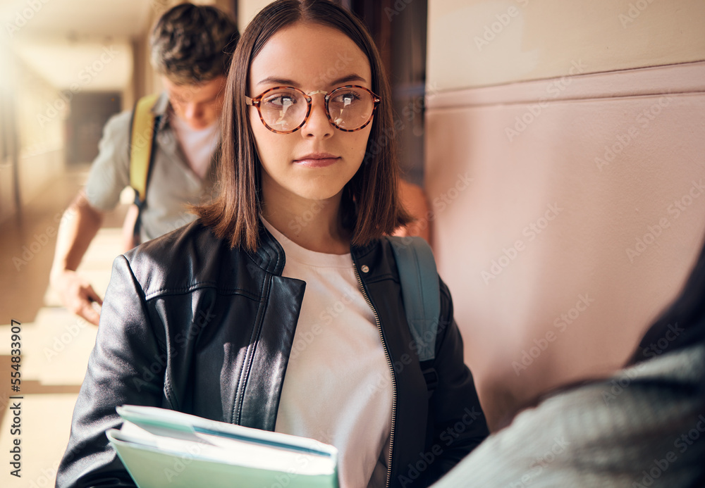 University student, girl and talking to friends at campus corridor with books for learning, educatio