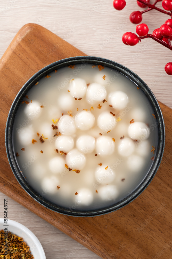 Little white tangyuan with sweet osmanthus honey and syrup soup.