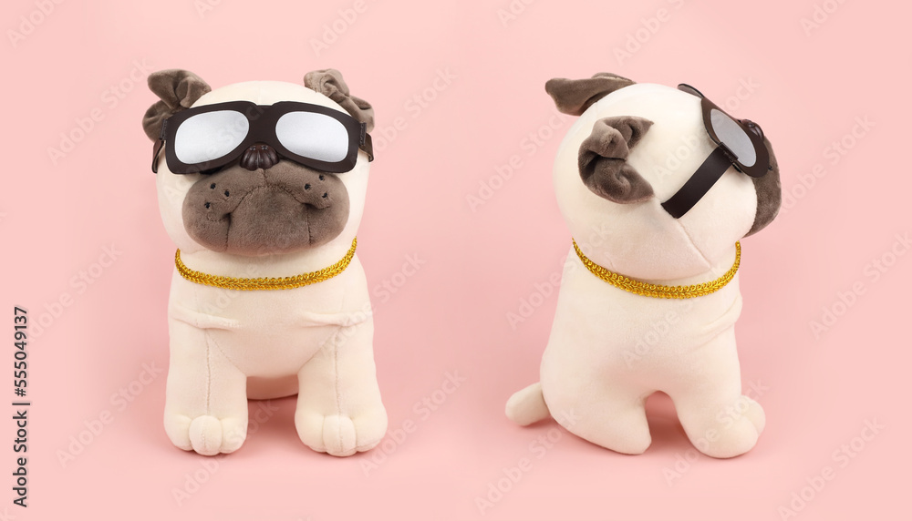 Two Plush soft beige pug dogs toys with sunglasses on pink background. Front view, side view, close-