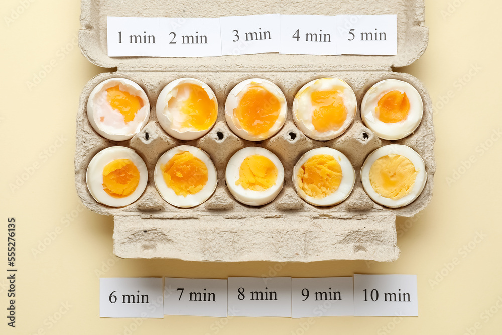 Timing of boiling chicken eggs on yellow background