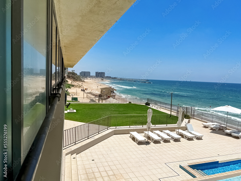 Seashore on sunny day, balcony view