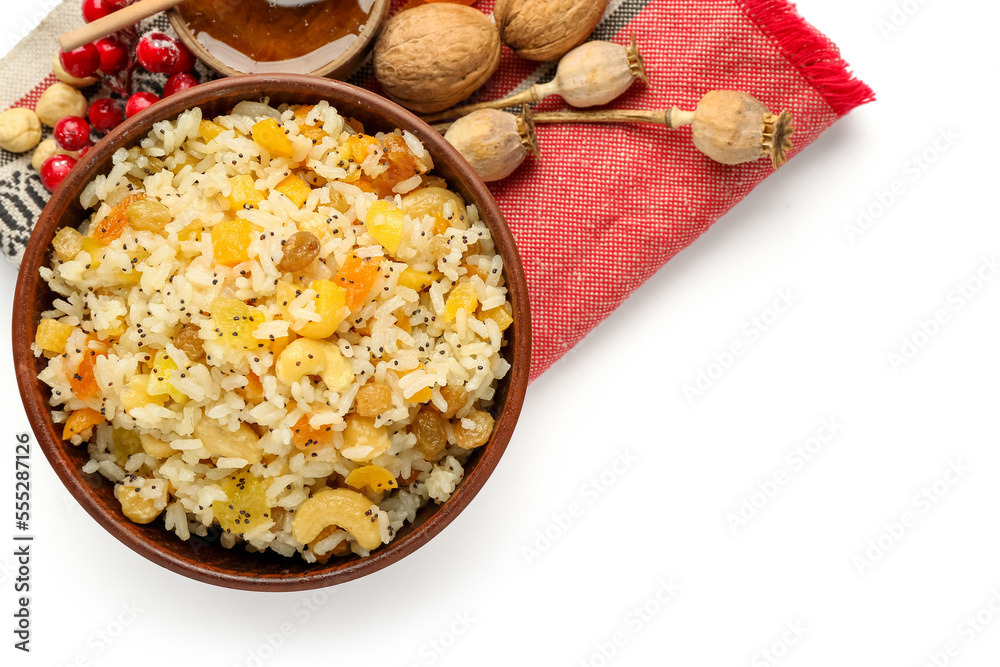 Napkin with bowl of rice Kutya and materials on white background餐巾纸配一碗米饭库蒂亚和白底配料