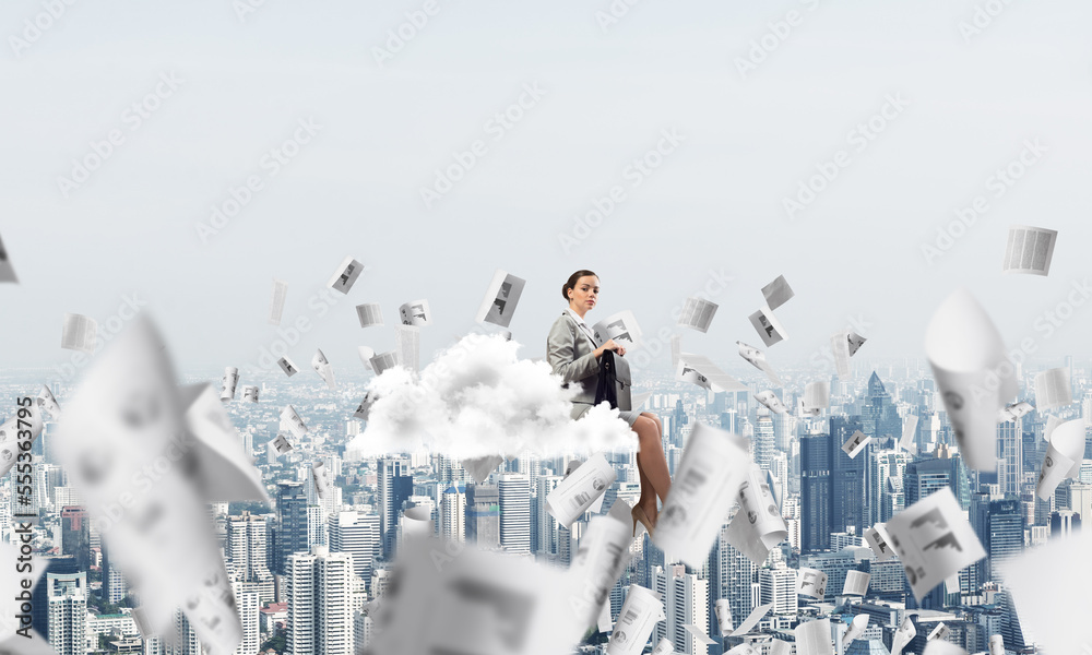 Woman float above city on cloud and papers flying around