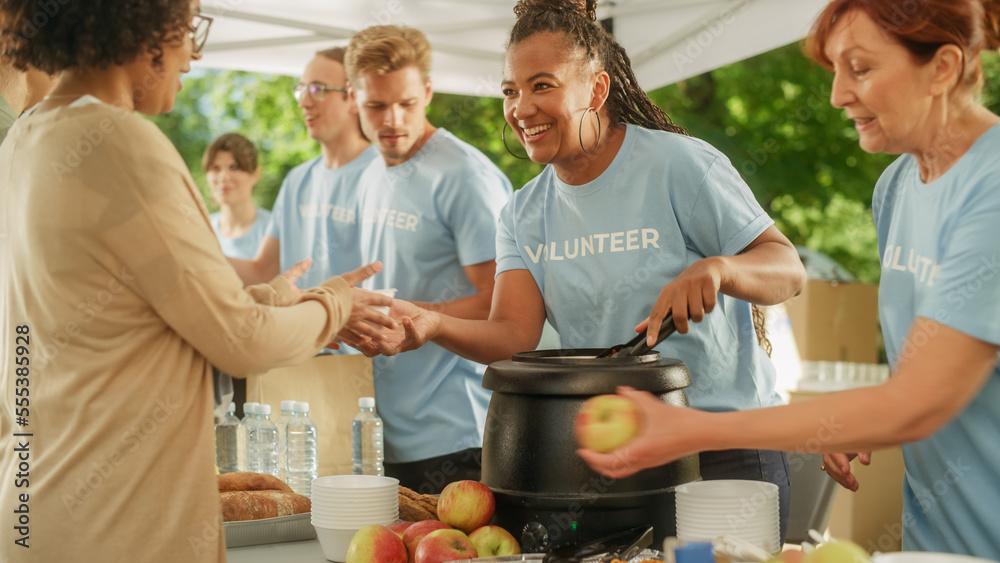 Group of Volunteers Preparing Free Food Rations for Poor People in Need. Charity Workers and Members