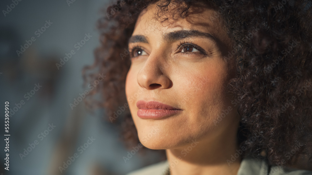 Close Up Portrait of a Beautiful Female Creative Specialist with Curly Hair Smiling. Young Successfu