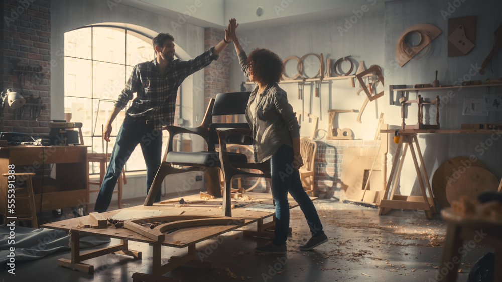 Carpenter Unveiling His New Armchair Design to a Friend, Colleague or Client. Craftsman Removing the