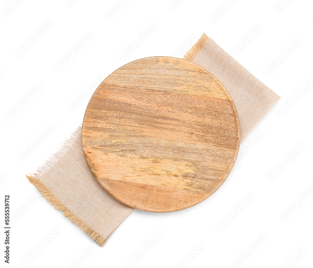 Round wooden cutting board and napkins isolated on white background