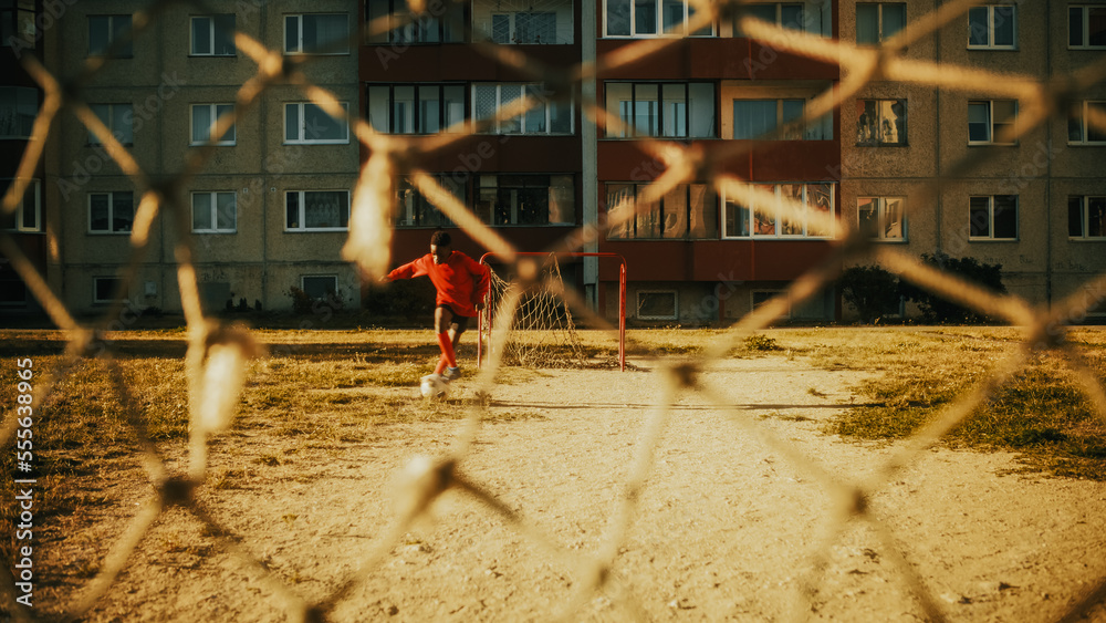 Young African Kid Playing with Ball in the Neighborhood. Young Black Boy Practicing Soccer Drills, S