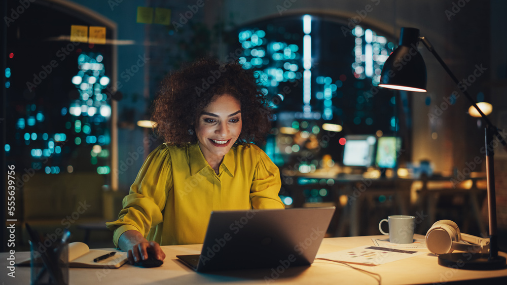 Creative Multiethnic Female Working on Laptop Computer in a Company Office. Happy Project Manager Br