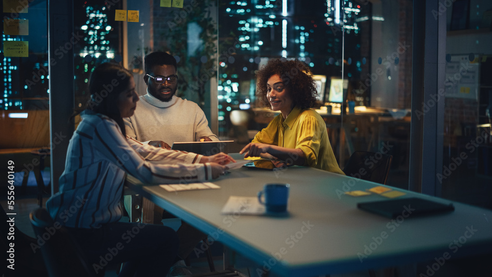 Excited Diverse Team Celebrating a Corporate Win, High Five Each Other Around the Table. Group of Yo