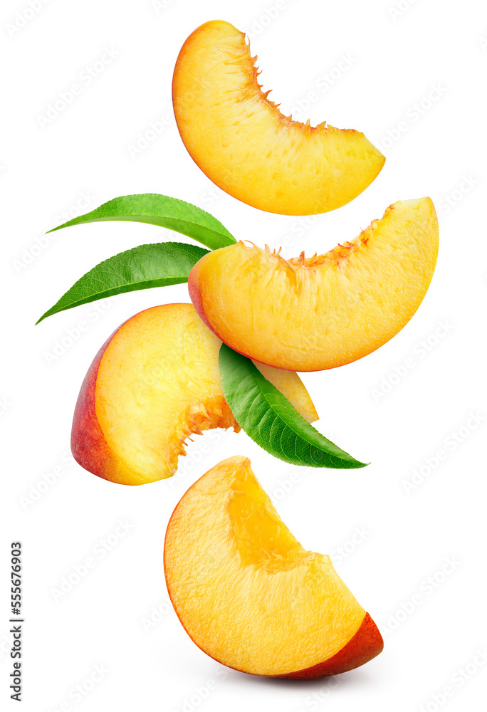 Peach isolated. Peach slices flying on white background. Falling peach pieces with leaf. Full depth 