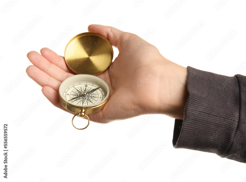 Woman with golden compass on white background