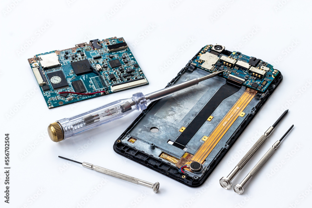 Electronics servise and repair concept - mobile phone with circuit board