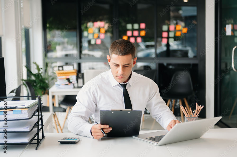 Mature business man executive manager looking at laptop watching online webinar training or having v