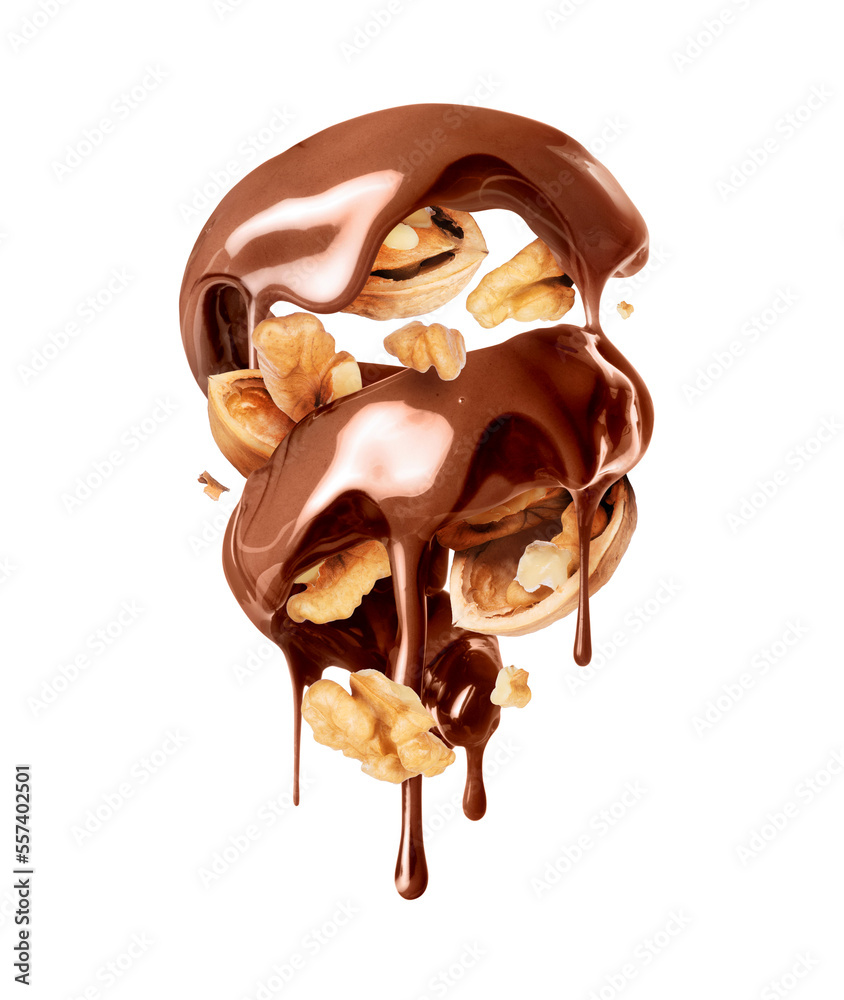 Melted chocolate in a twisted shape with walnuts closeup isolated on a white background