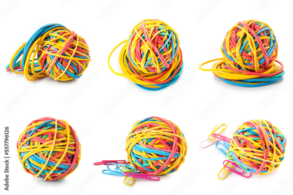 Group of colorful rubber band balls with stationery on white background