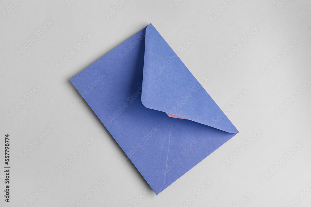 Lilac envelope on grey background