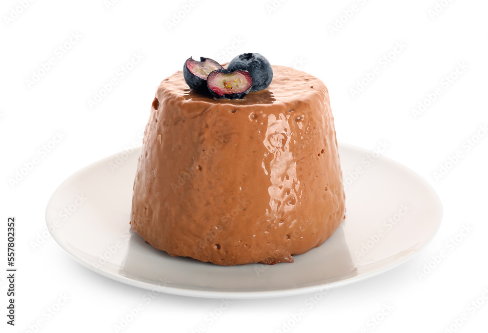 Plate with delicious chocolate pudding and sliced blueberry on white background