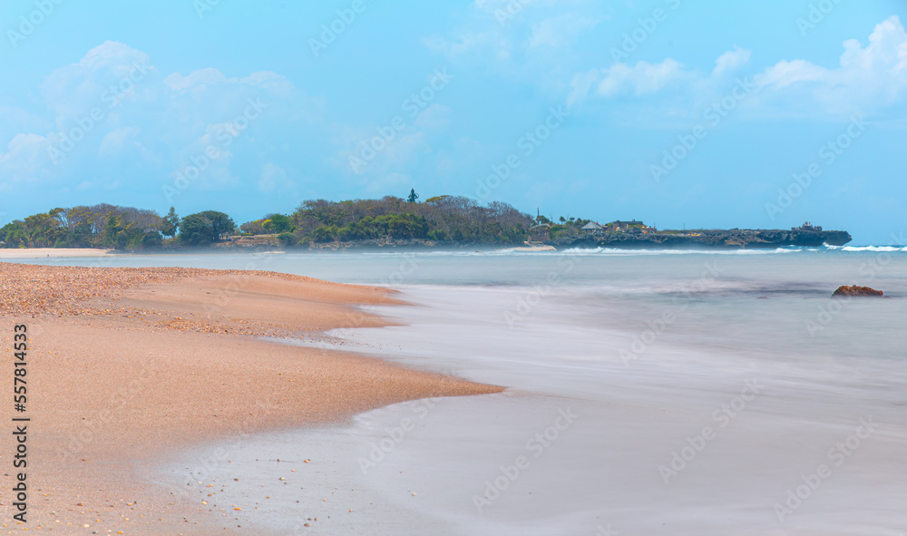 Empty tropical sandy beach and clear sea background - Bali, Indonesia