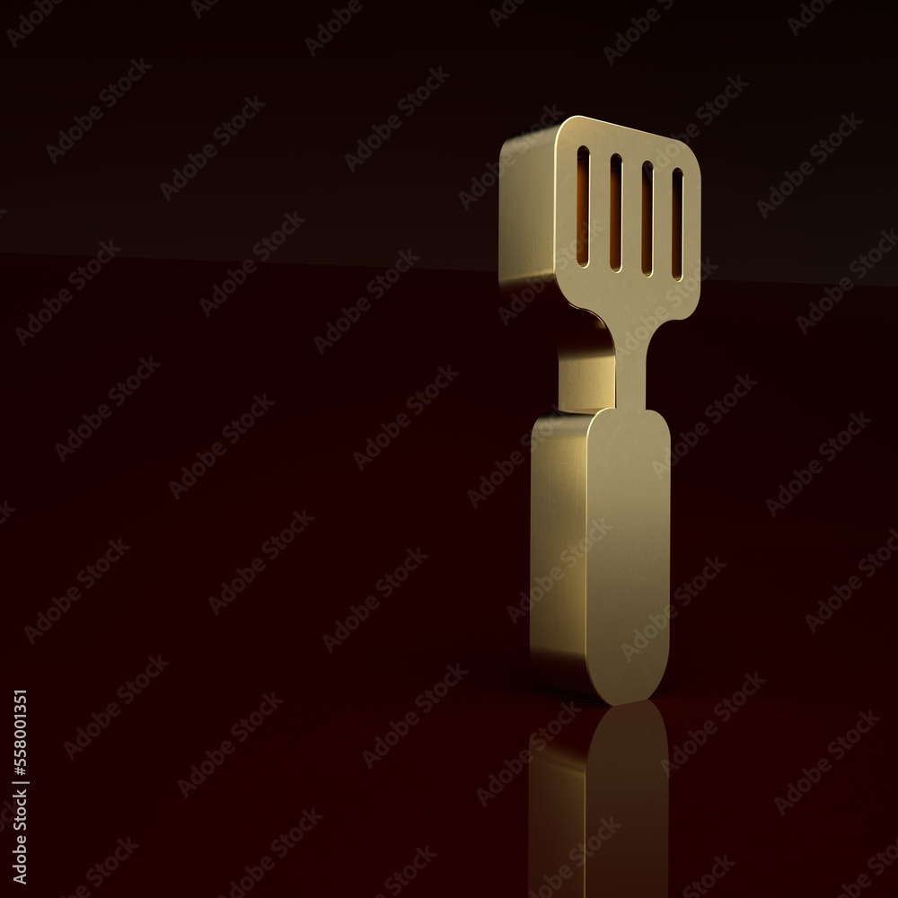 Gold Spatula icon isolated on brown background. Kitchen spatula icon. BBQ spatula sign. Barbecue and