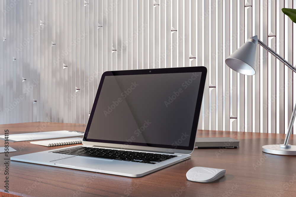 Perspective view on blank dark modern laptop monitor with space for your logo or text on brown table