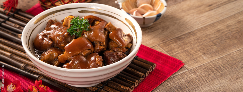 Taiwanese traditional food pork knuckle in a bowl for Chinese Lunar New Year meal.