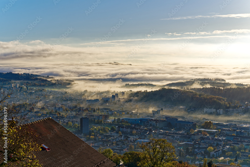 Aerial view over Swiss City of Biel Bienne, Canton Bern, seen from village Evilard Leubringen on a s