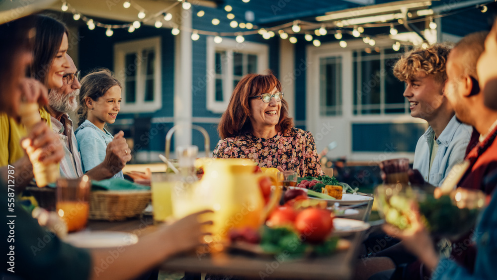 Parents, Children, Relatives and Friends Having an Open Air Barbecue Dinner in Their Backyard. Old a