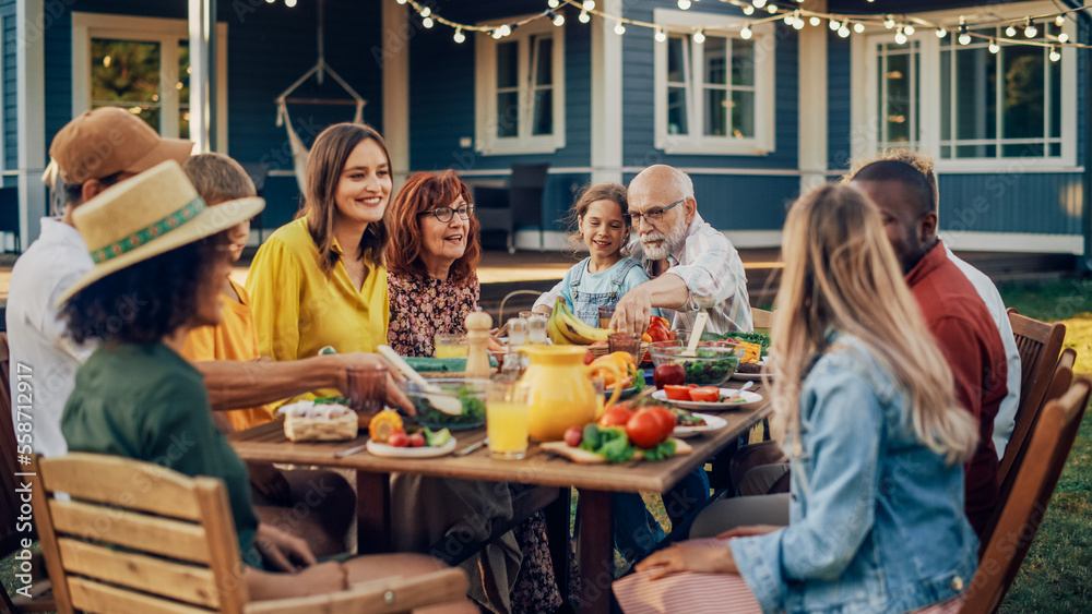 Group of Multiethnic Diverse People Having Fun, Communicating with Each Other and Eating Vegetarian 