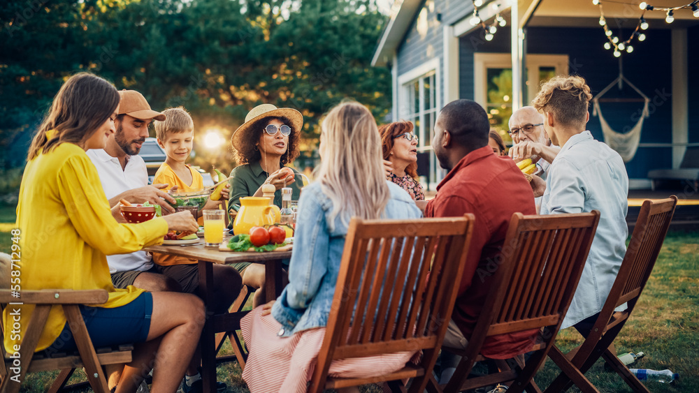 Group of Multiethnic Diverse People Having Fun, Communicating with Each Other and Eating Vegetarian 