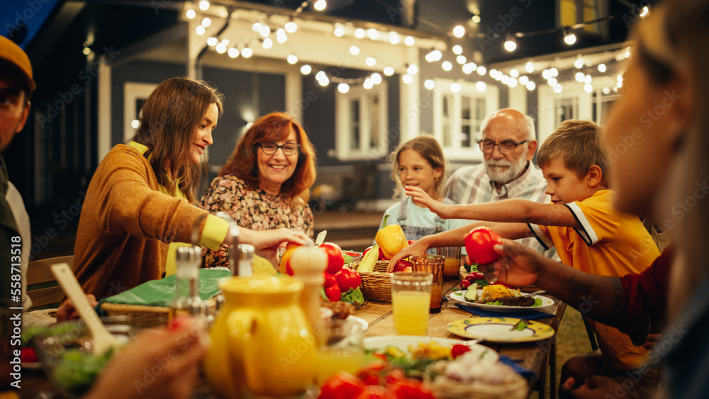 Group of Multiethnic Diverse People Having Fun, Communicating with Each Other and Eating at Outdoors