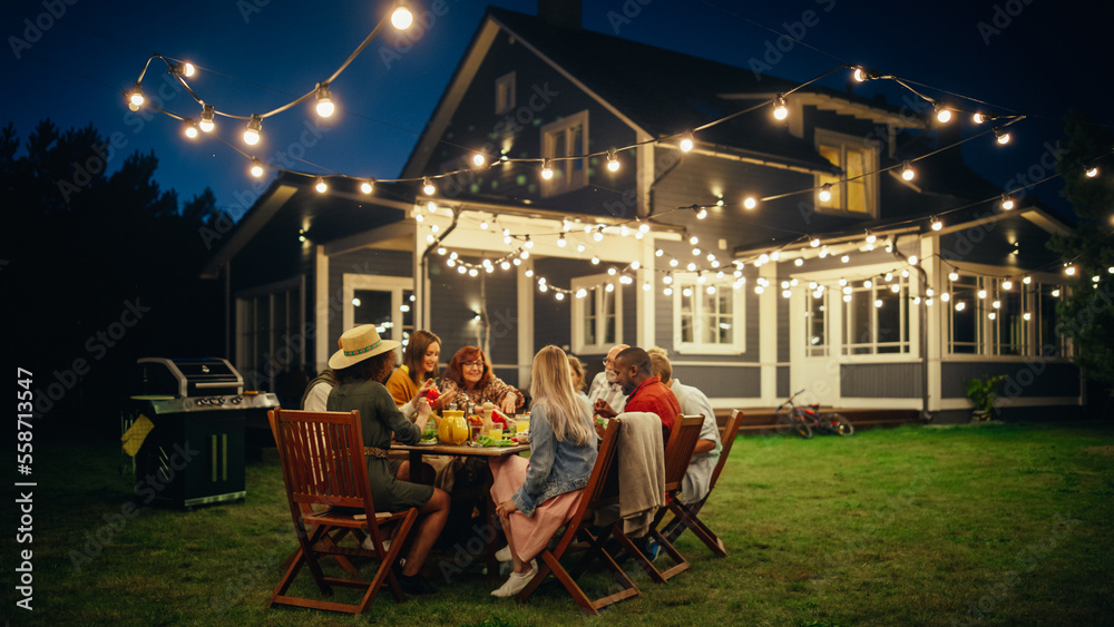 Group of Multiethnic Diverse People Having Fun, Communicating with Each Other and Eating at Outdoors