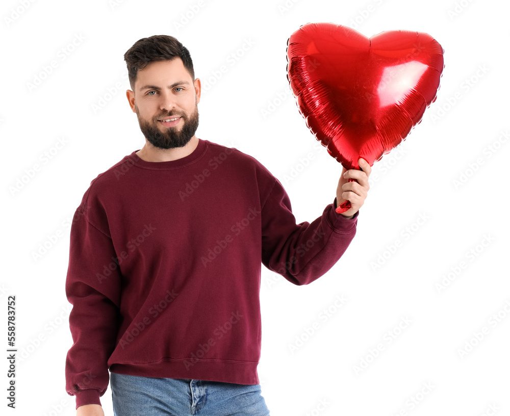 Young bearded man with balloon for Valentines Day on white background