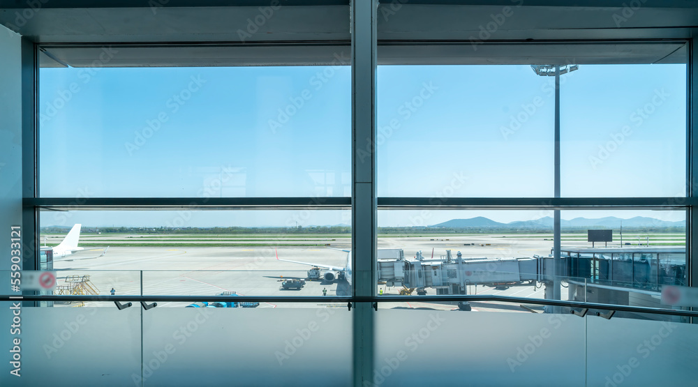 Ground glass window of airport terminal