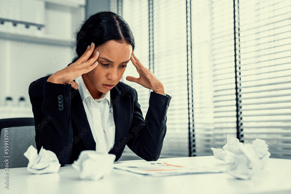 A competent female employee who has become completely exhausted as a result of overburdened work. Co