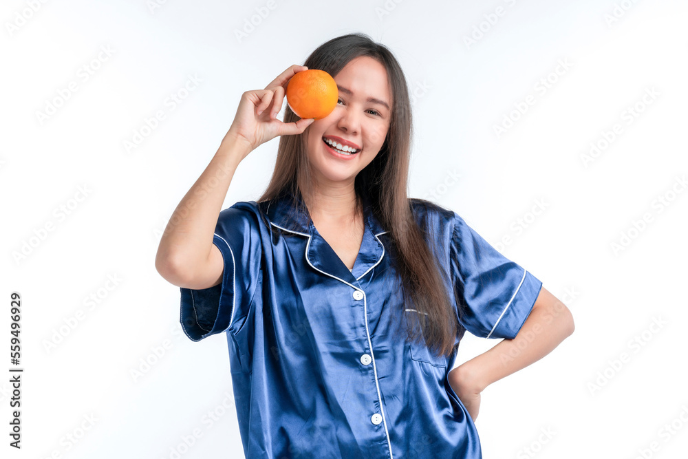 heathy lifestyle asian female in pajama hand hold fresh apple fruit smiling cheerful isolate white b