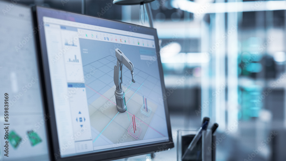 Close Up of a Computer Monitor Display with 3D Software Interface with Digital Robotic Arm Operation