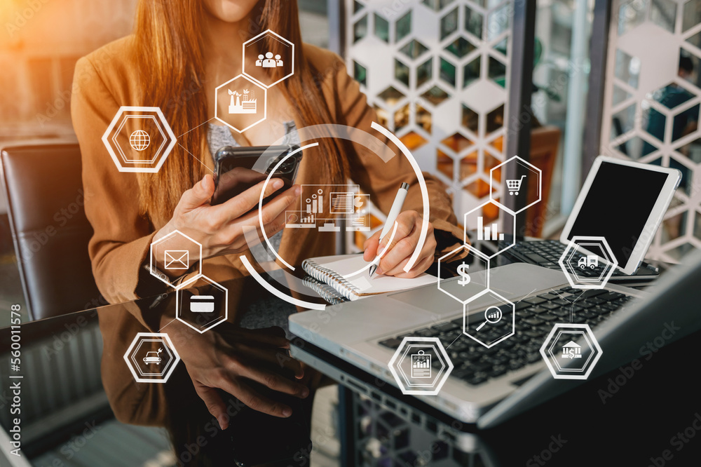 businesswoman working with mobile phone and tablet and laptop computer Internet with Augmented Reali