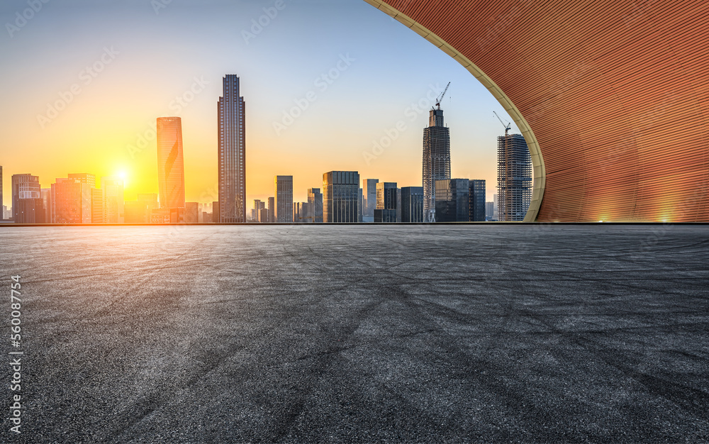 Asphalt road and modern city skyline with buildings in Ningbo, Zhejiang Province, China. 