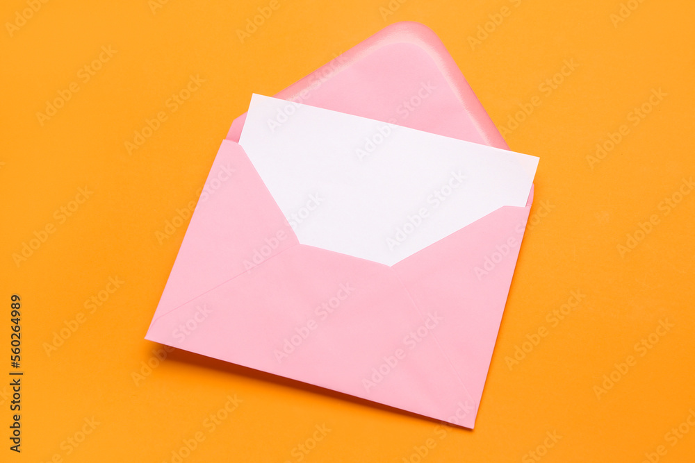 Pink envelope with card on color background