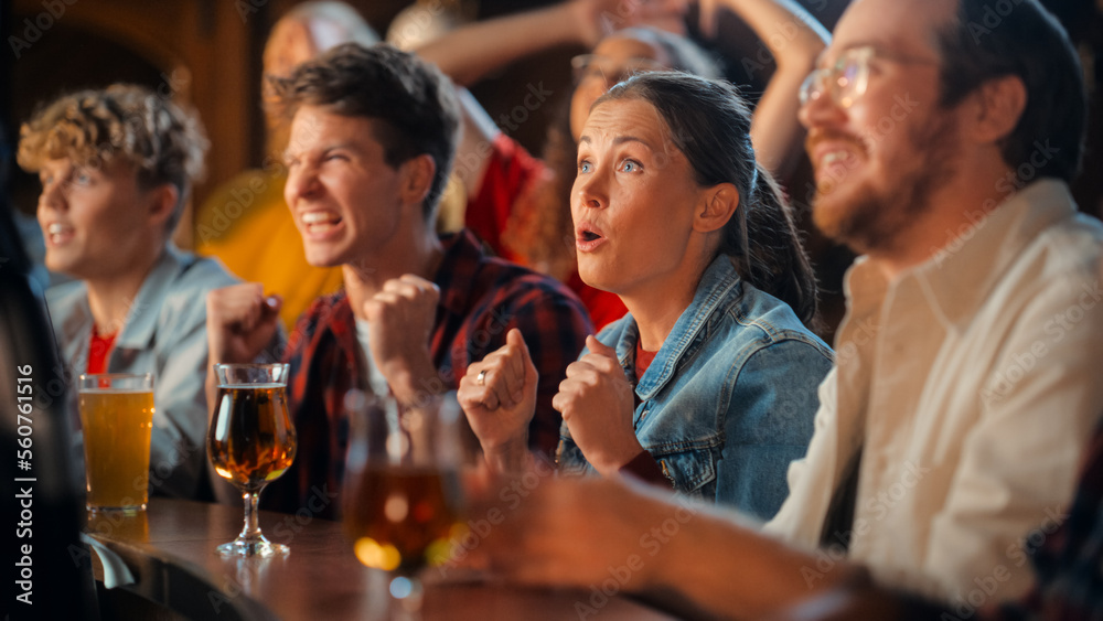 Excited Beautiful Female Sitting at a Bar Stand with Group of Friends, Cheering for a Soccer Team Pl