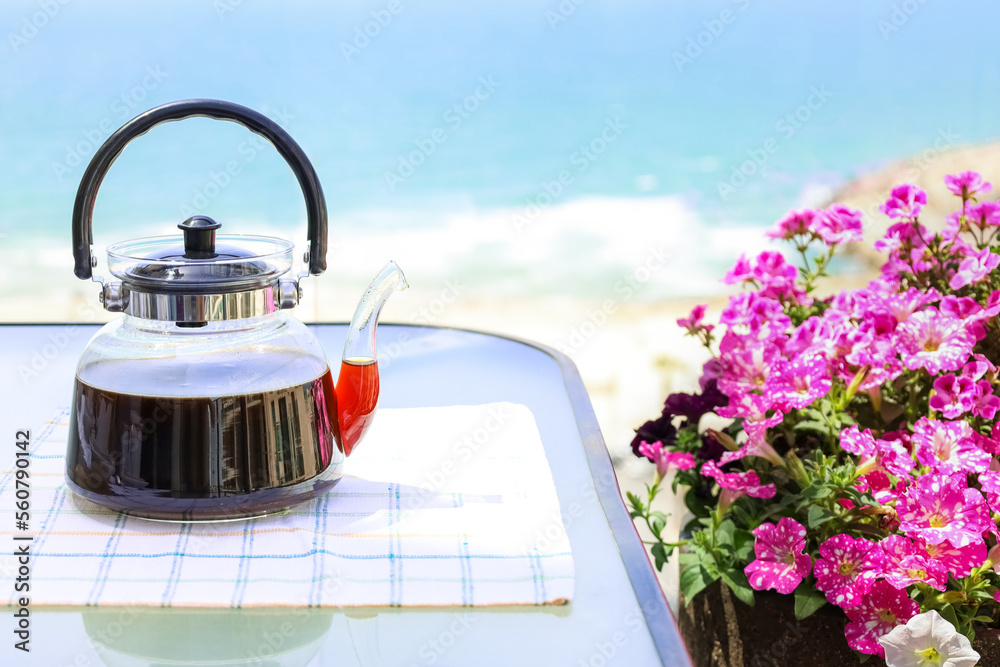 Coffee pot on table near window, closeup