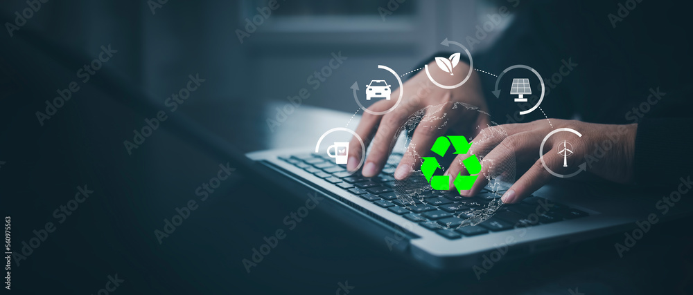 Businessman using laptops and touch recycle symbol with virtual modern reduce CO2 emission concept w