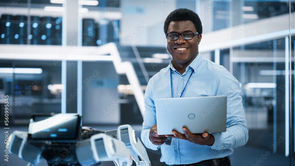 Portrait of a Handsome African Man Wearing Smart Corporate Wear and Glasses, Looking at Camera and S