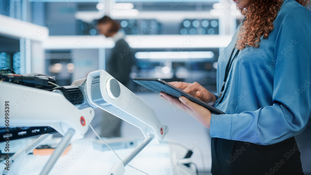 Close Up Footage of a Female Holding and Using Tablet Computer in High Tech Modern Industrial Office