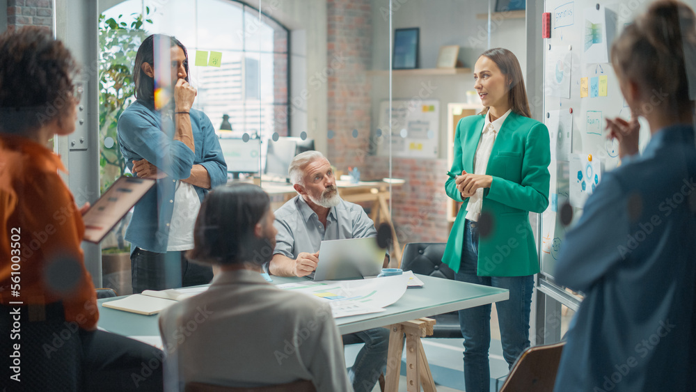 Woman Doing a Presentation in a Meeting Room at Office With her Team. Female Excutive Manager Presen